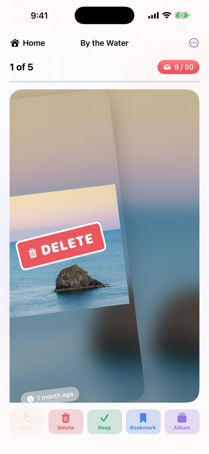 PhotoToGo's swipe deck: a photo mid-swipe under a red Delete stamp, over Keep, Favorite, Bookmark and Album actions.