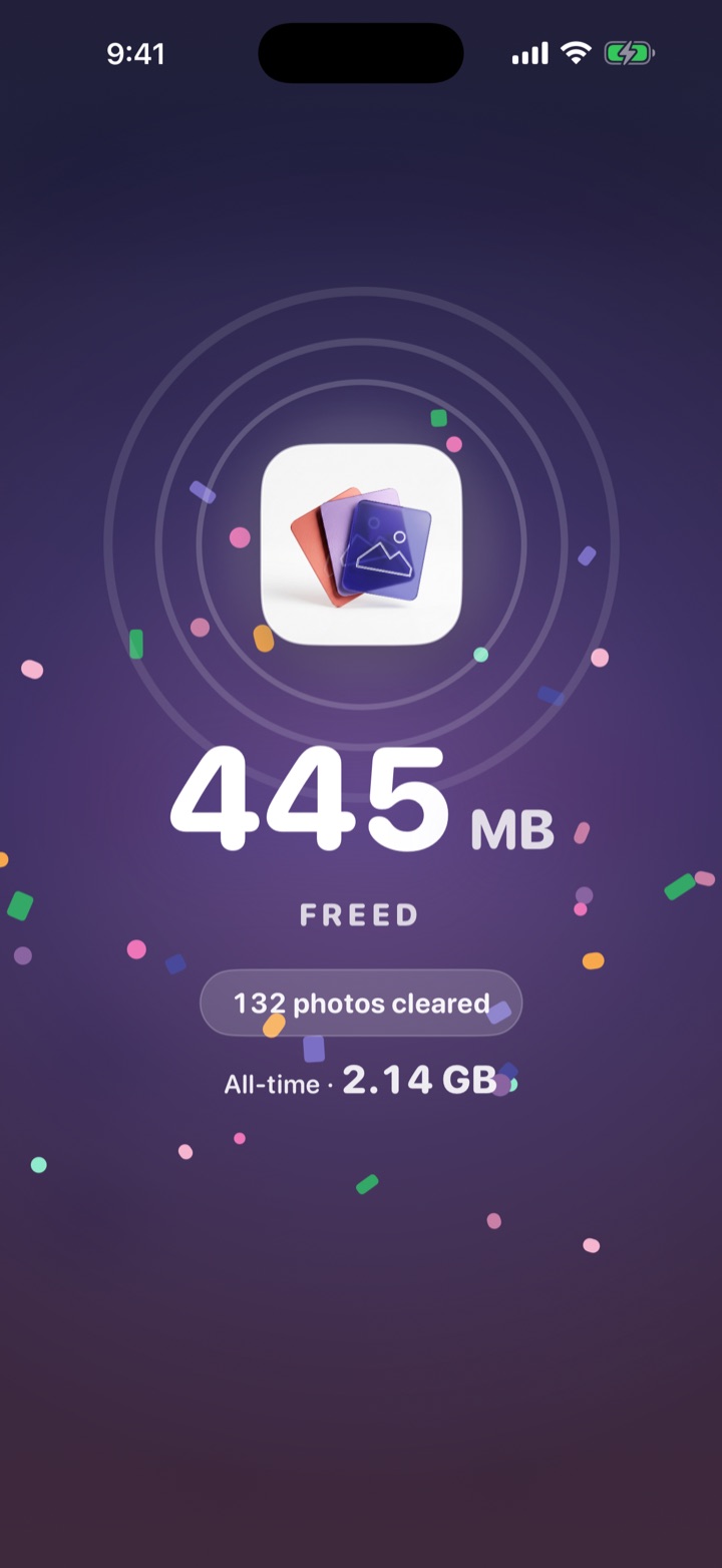 TidyTidy's clean-up celebration: 445 MB freed this session, 2.14 GB all-time, confetti around the app icon.